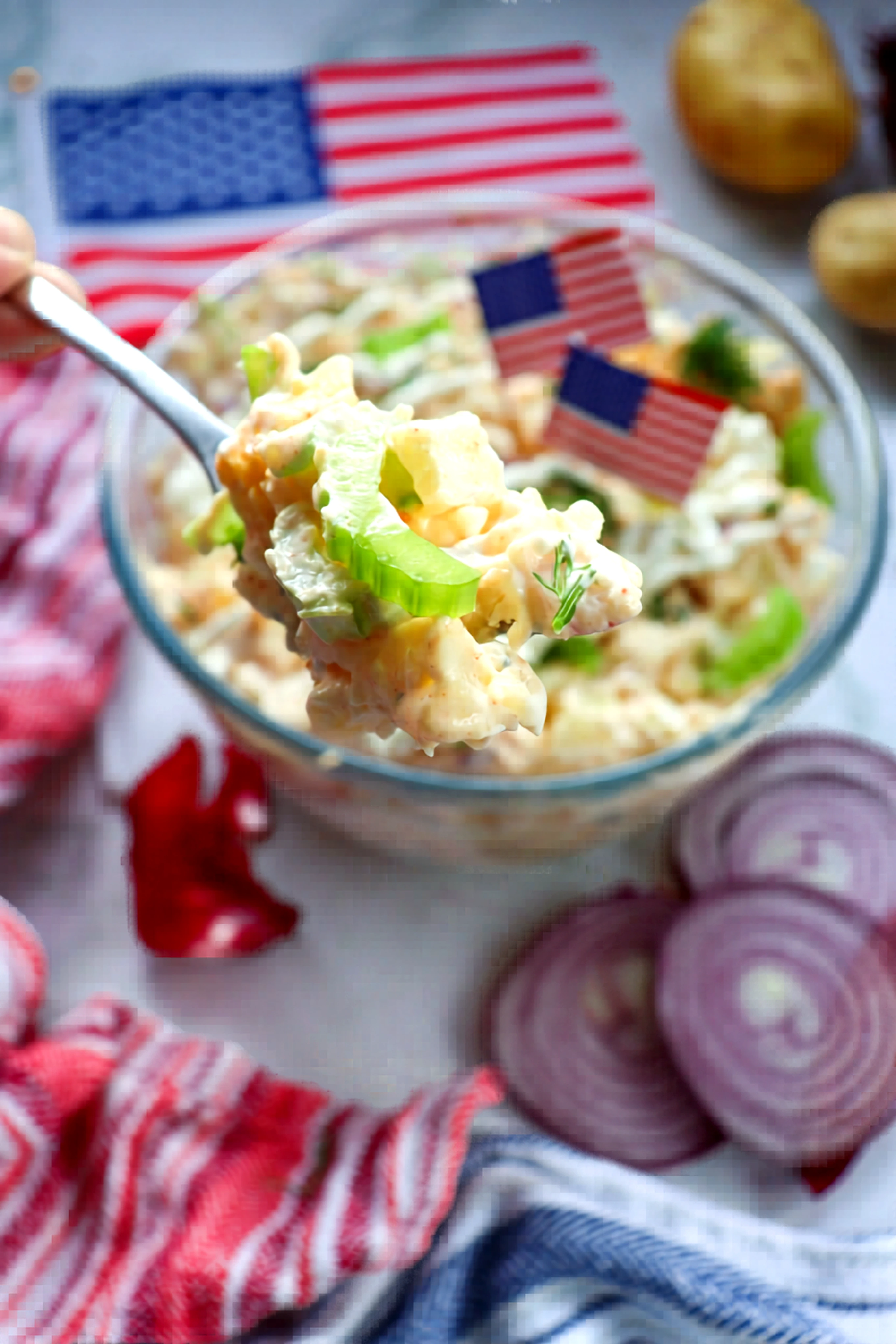 Close spoonful of classic potato salad