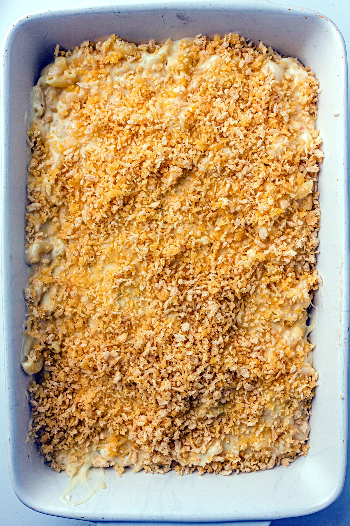 Breadcrumb topping added to baked mac and cheese