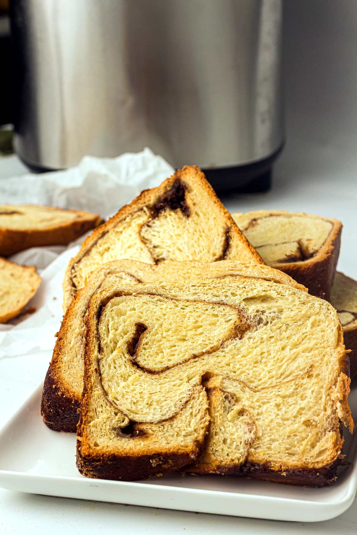 Sliced stack of bread machine cinnamon swirl bread