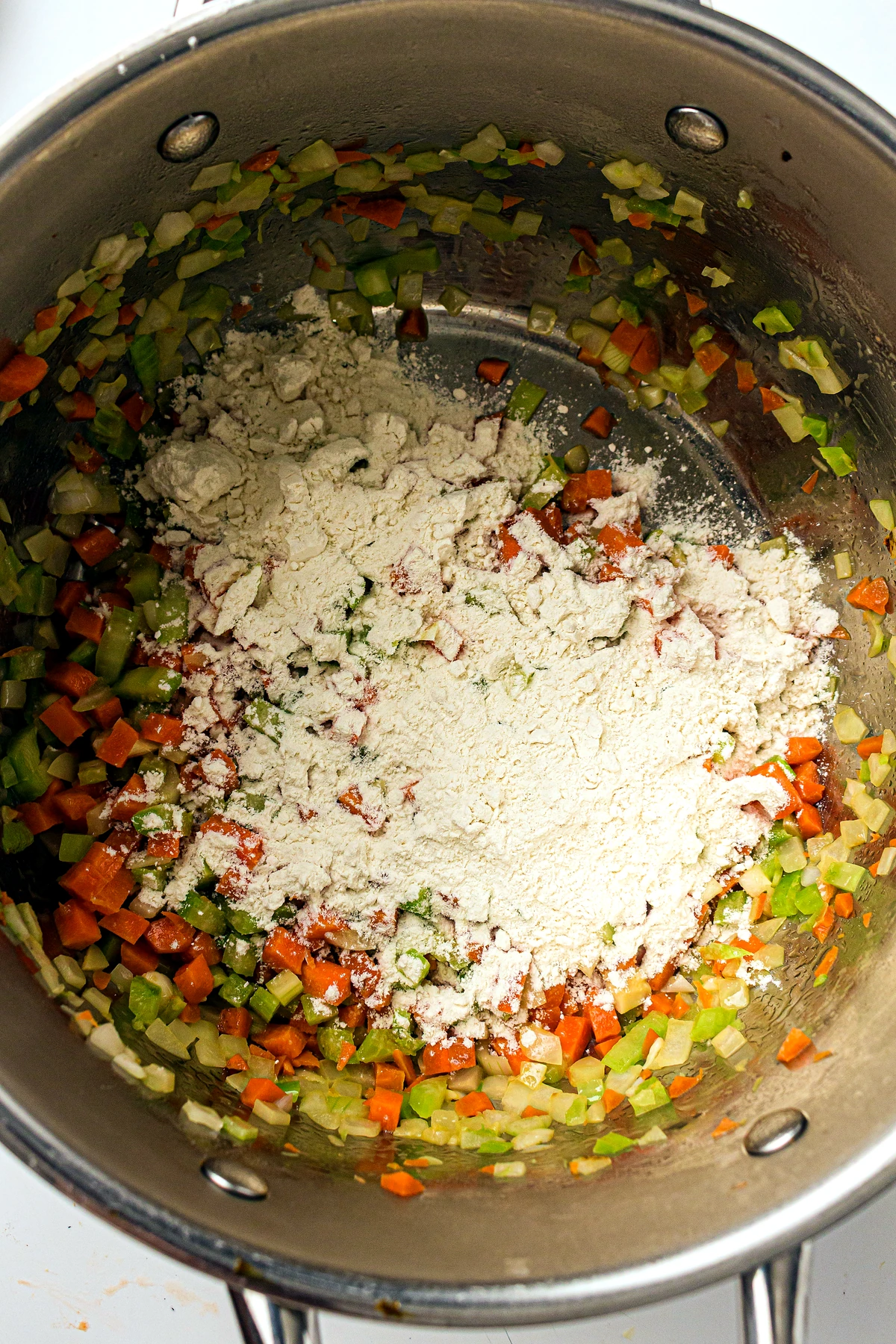 Flour added to chicken pot pie vegetables