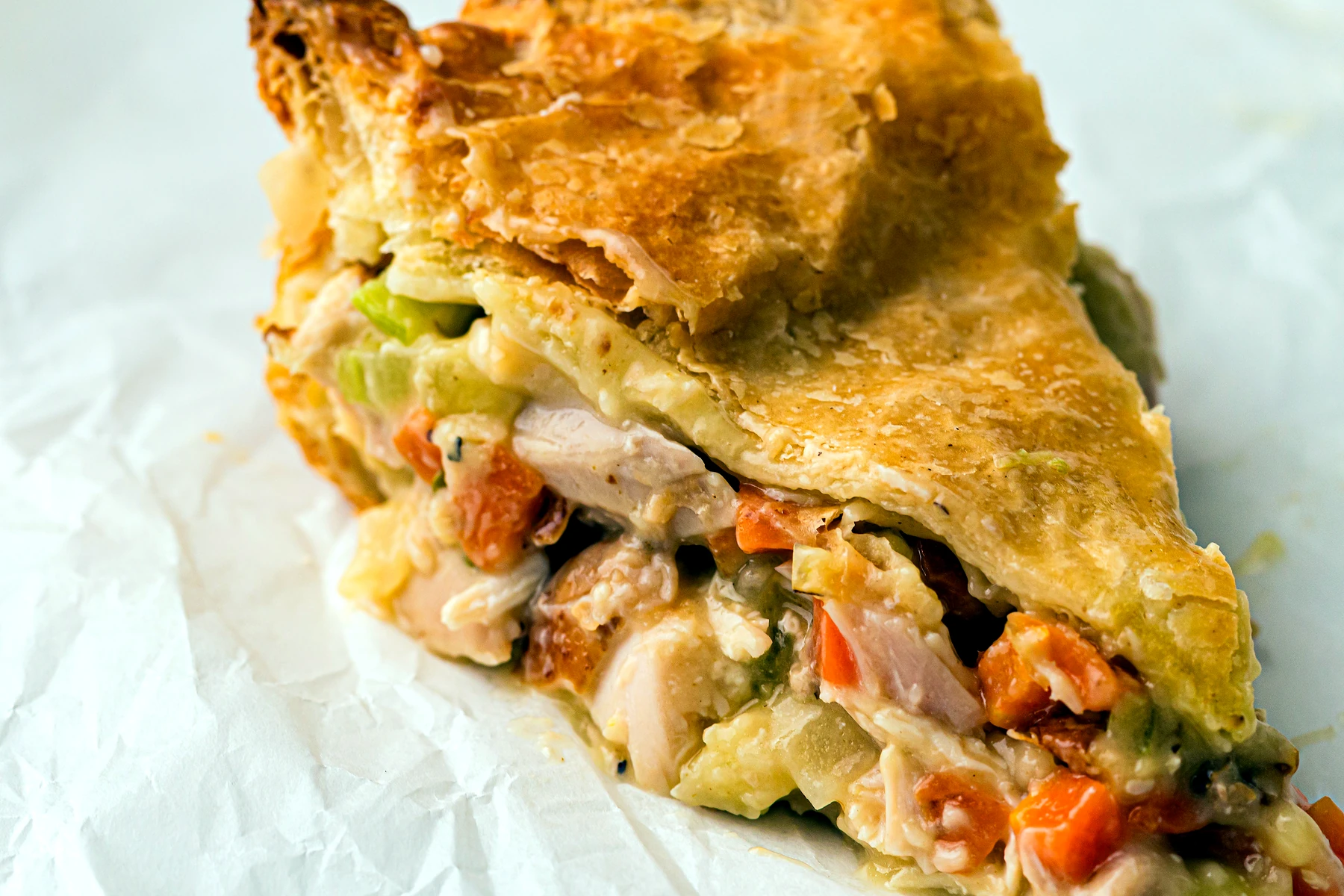 Close look at the creamy filling inside chicken pot pie