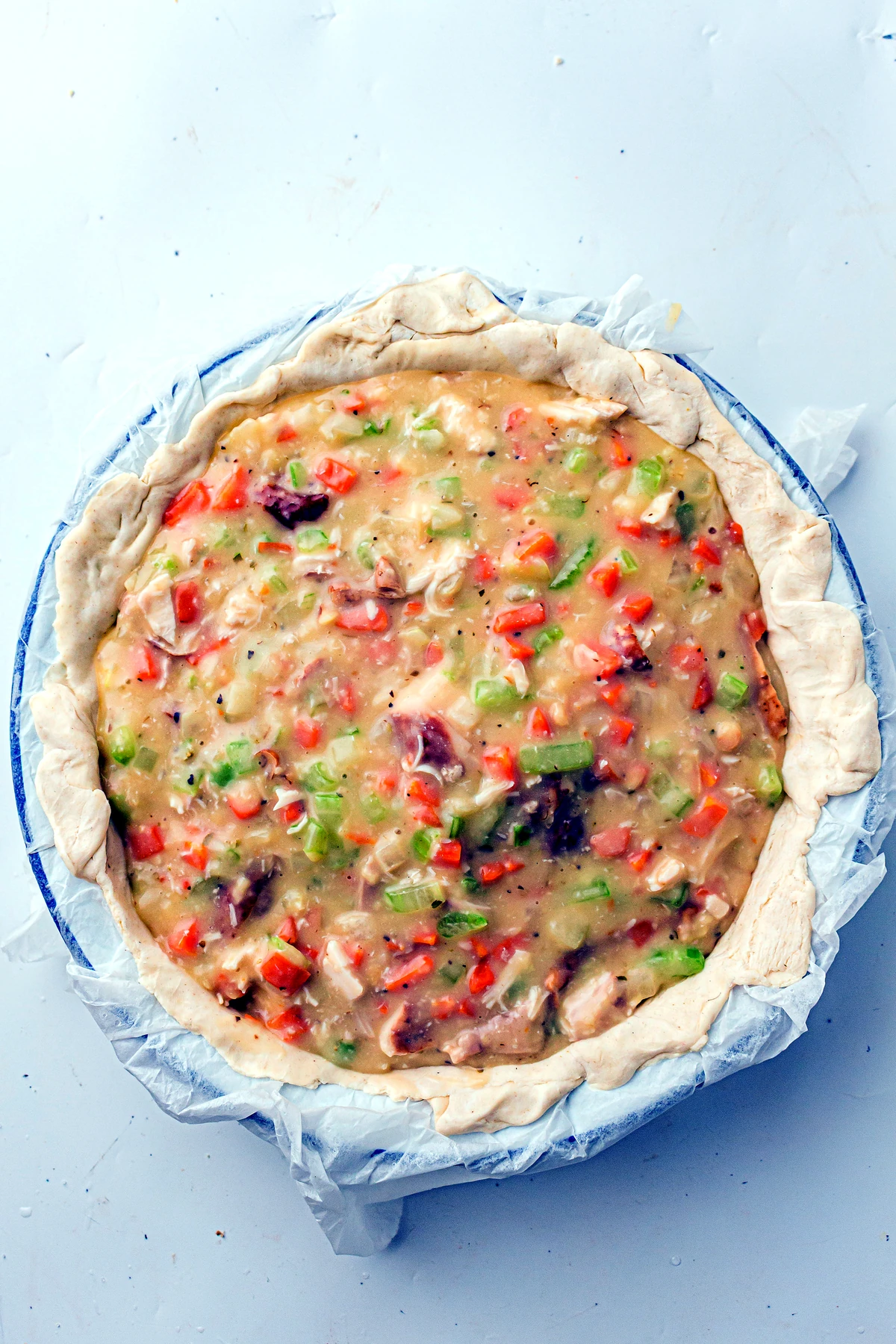 Chicken pot pie filling added to pie crust