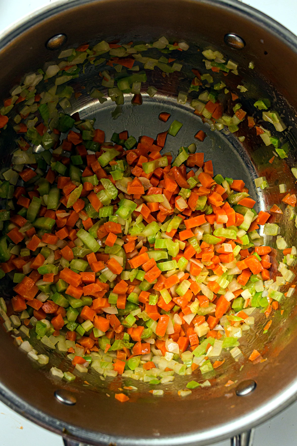 Vegetables sauteing in butter for chicken pot pie