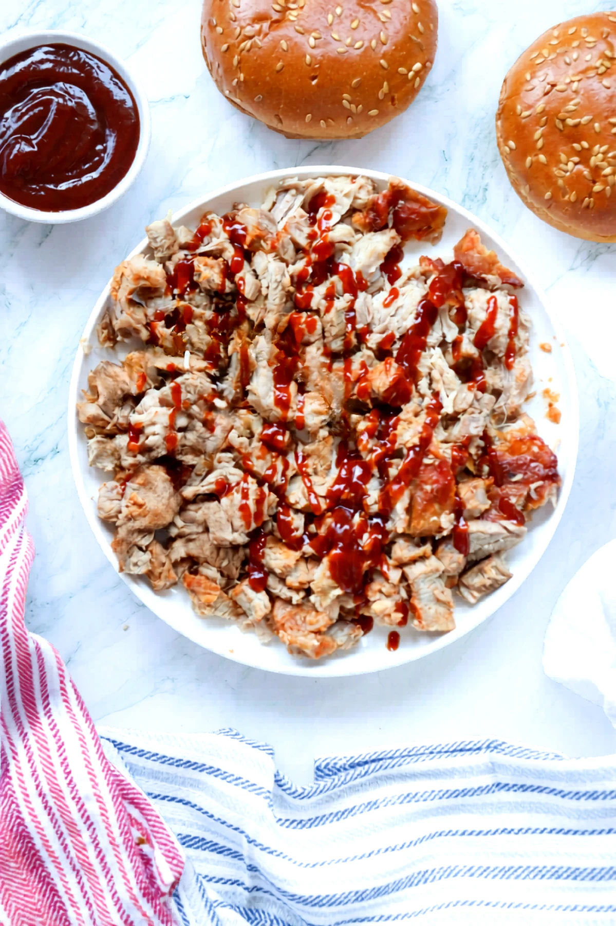 Close look at shredded pork tossed with barbecue sauce for sandwiches.