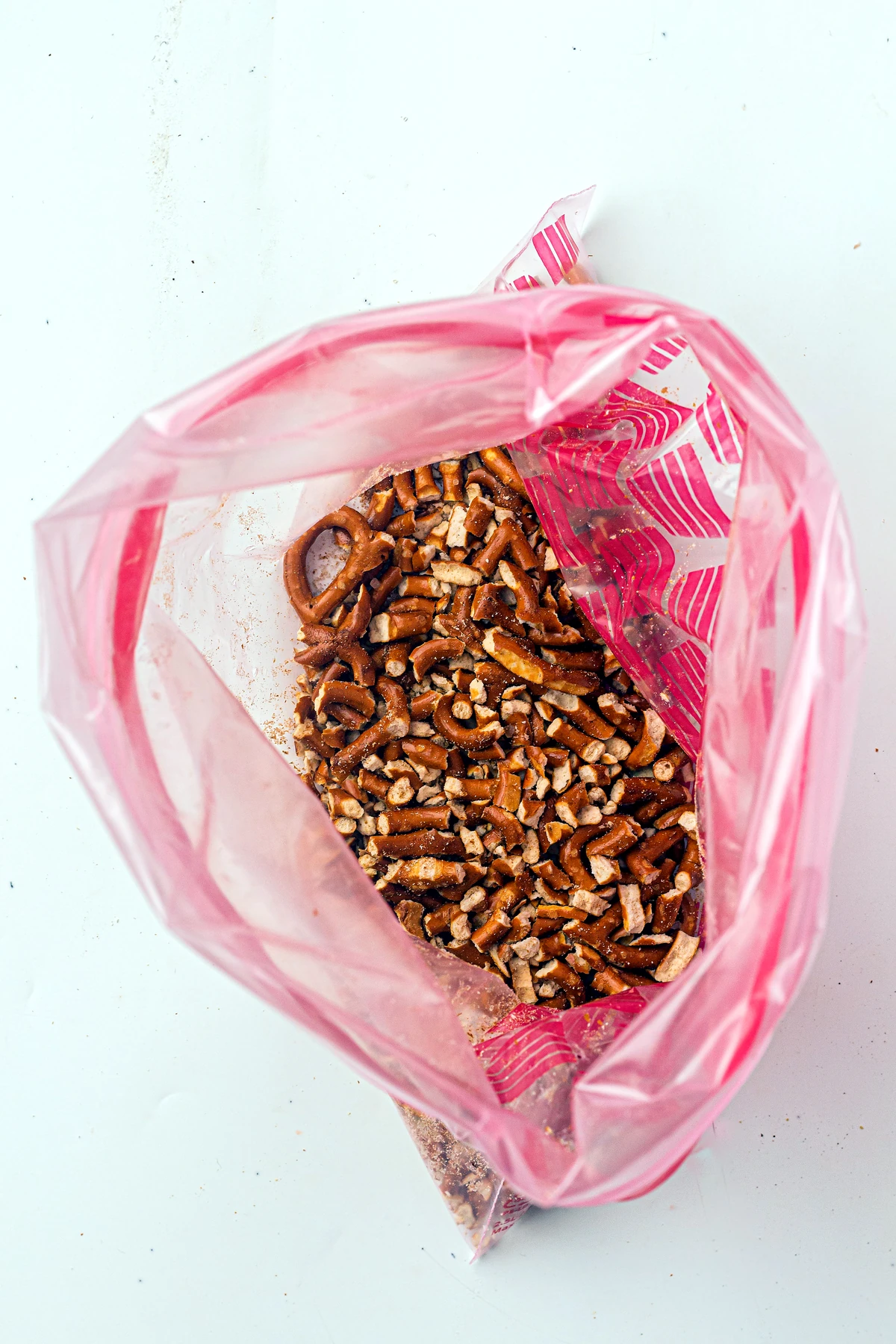 Pretzels being crushed for kitchen sink cookies