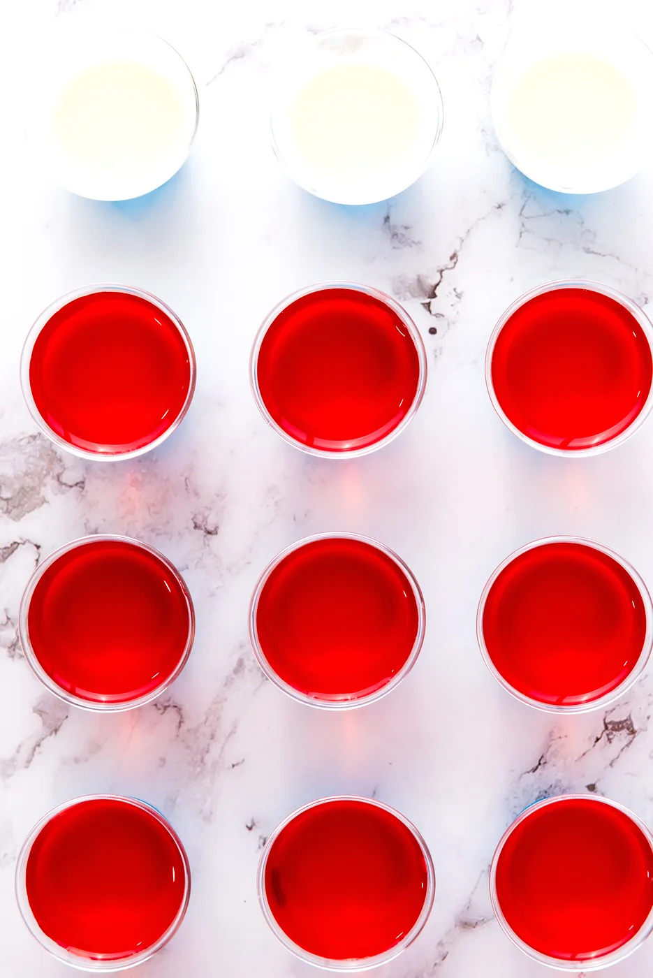 Red gelatin layer poured over white and blue layers