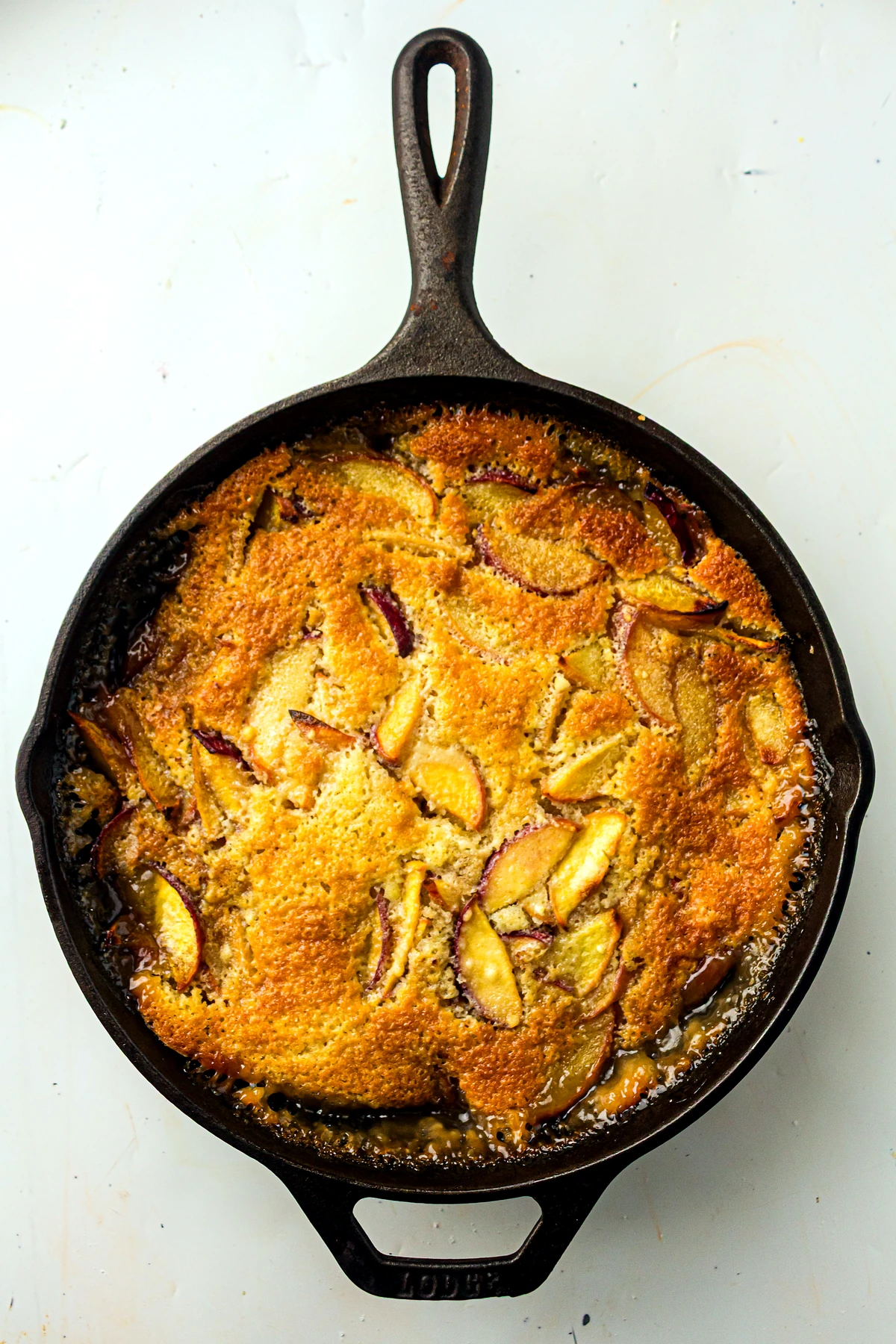 Golden peach cobbler baked in a skillet