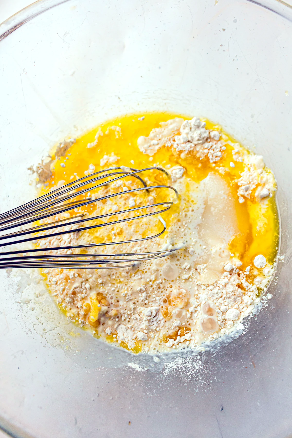 Peach cobbler batter being whisked