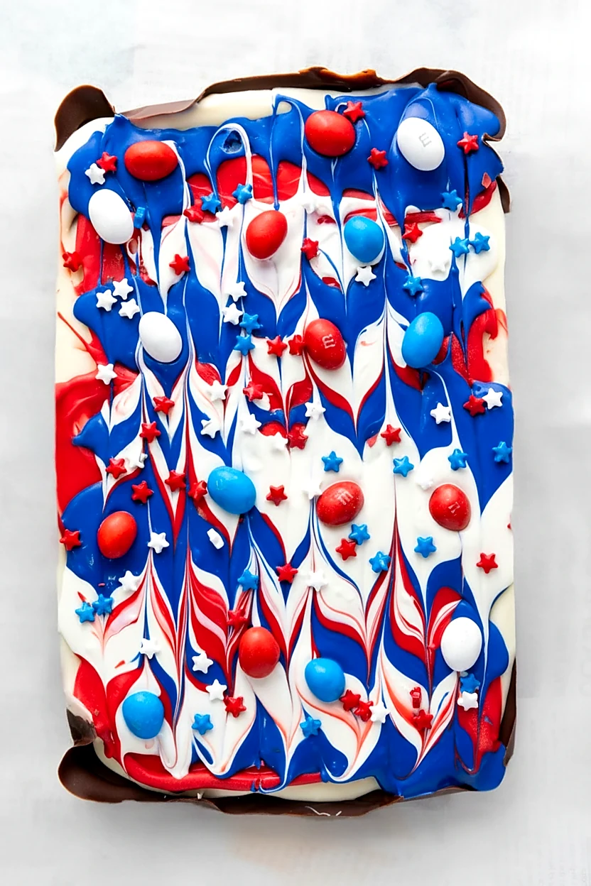 Finished slab of red white and blue chocolate bark before serving