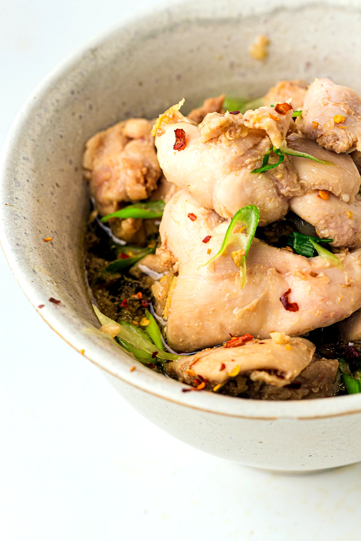 Bowl of slow cooker honey garlic chicken