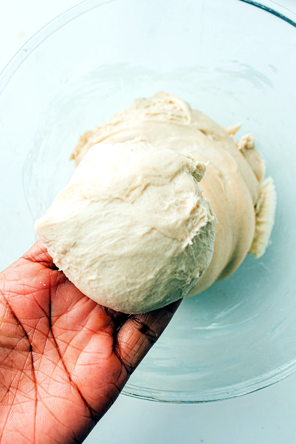Smooth sourdough roll dough ready to rise