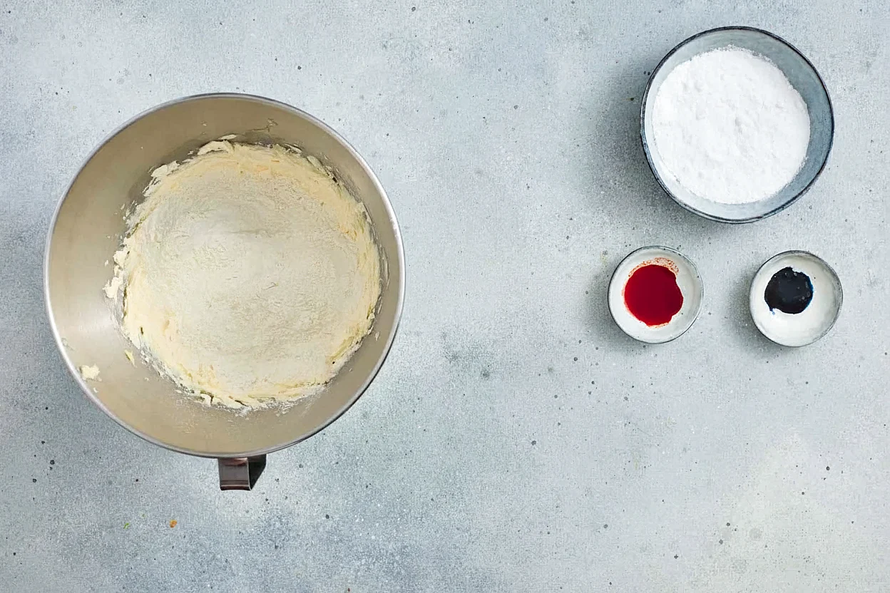 Smooth crinkle cookie dough in mixer bowl ready to be divided