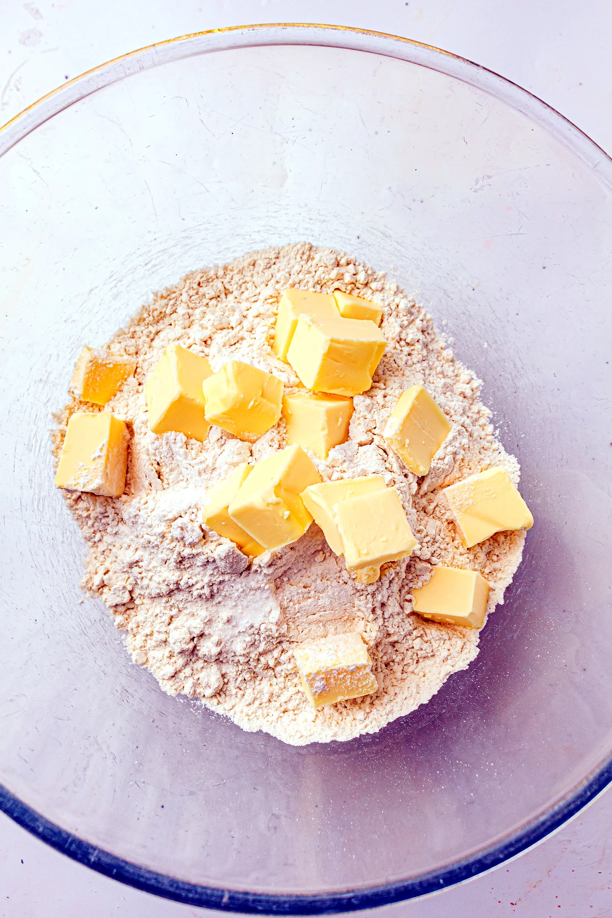 Butter cut into flour for shortcake biscuits