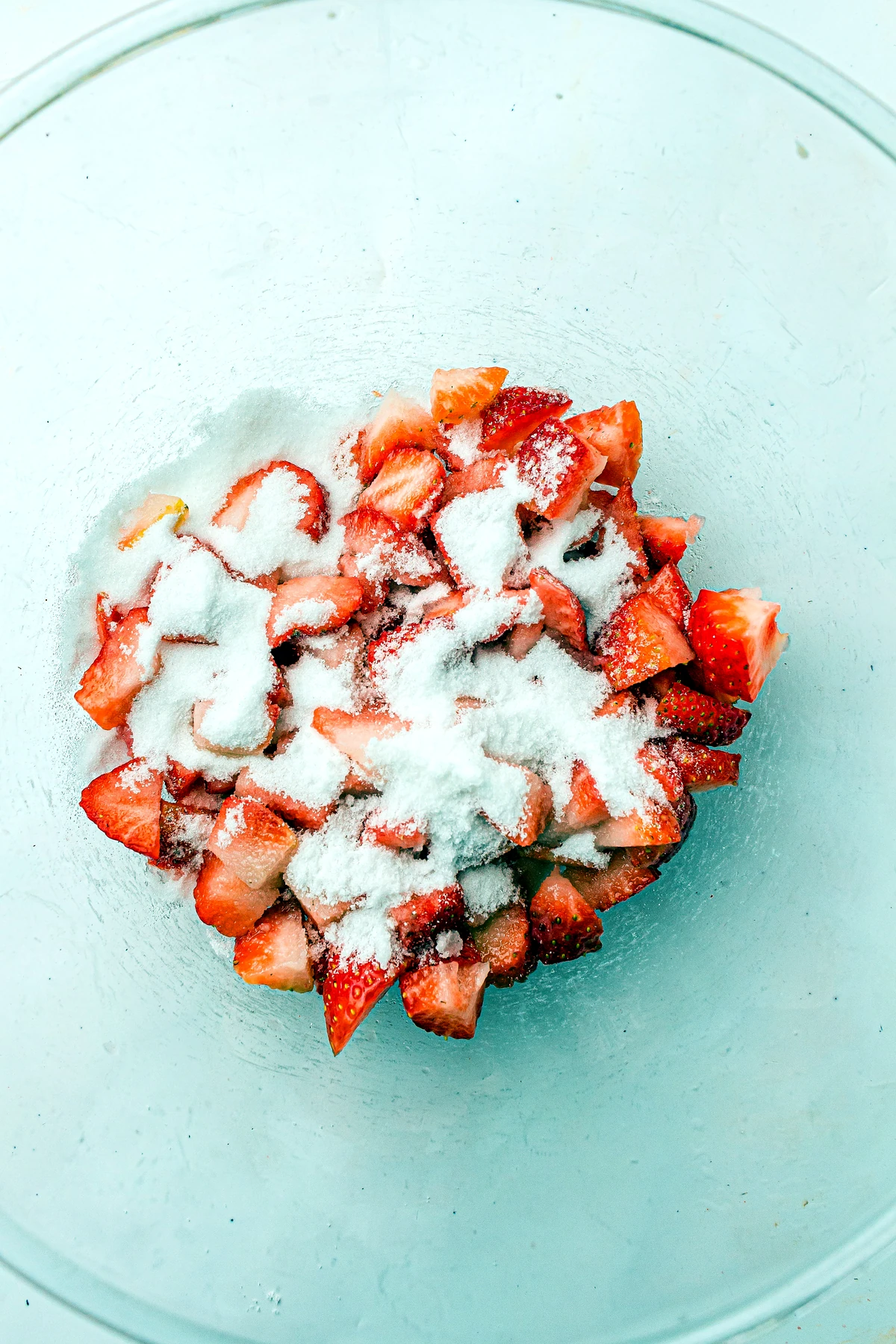 Strawberries tossed with sugar for shortcake