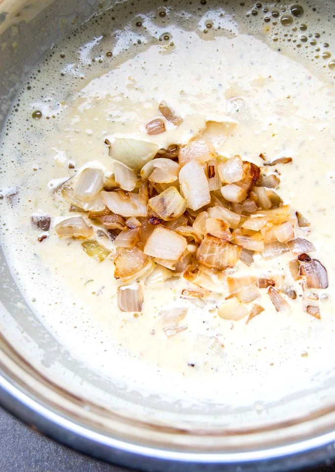 Mixing chickpea batter for sweet potato frittata