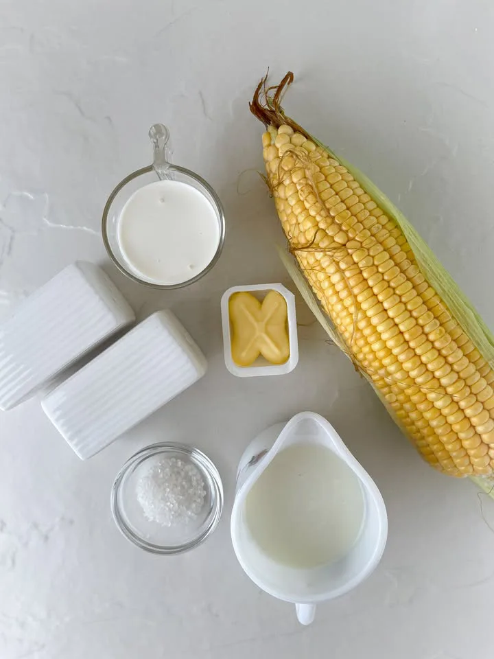 Fresh corn milk butter flour and seasonings for homemade creamed corn