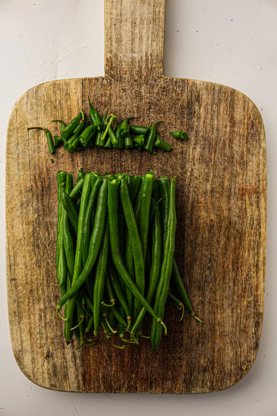 Fresh green beans with the tough stem ends trimmed