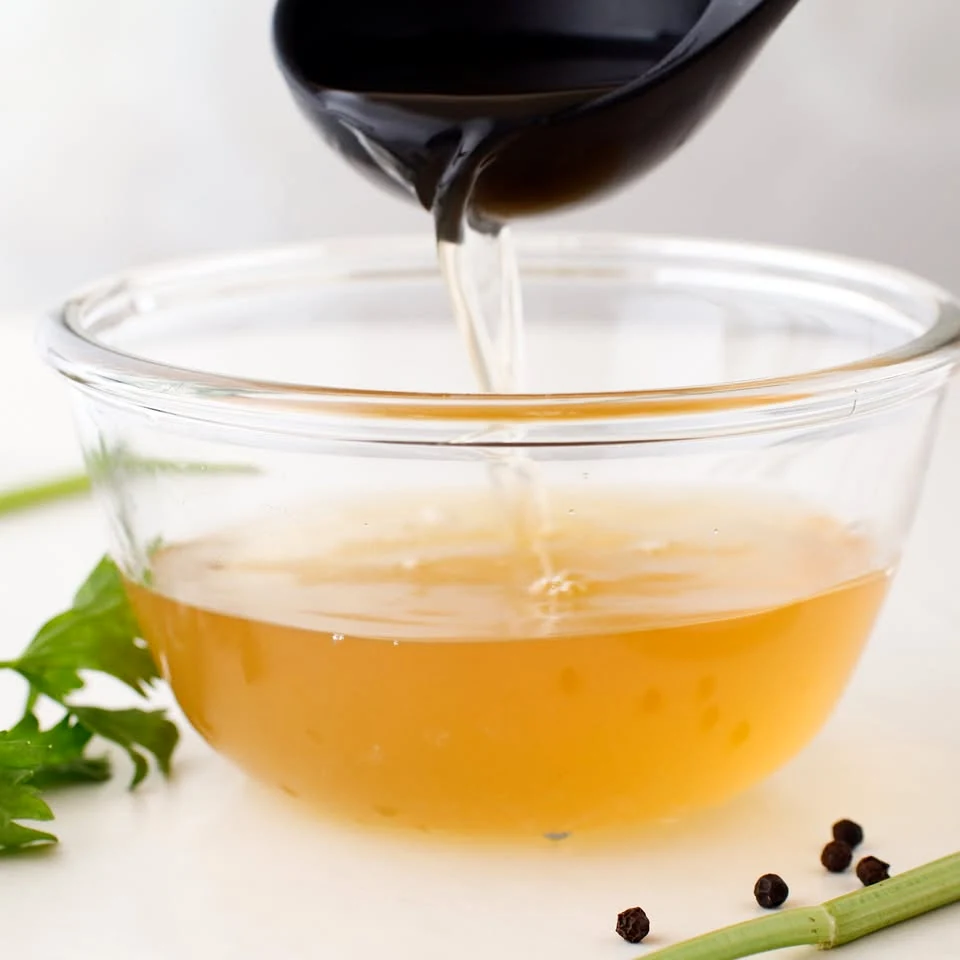homemade corn stock pouring