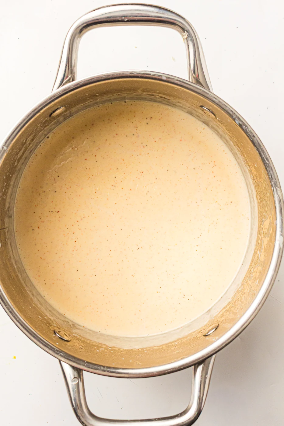 Smooth pourable cream sauce for scalloped potatoes