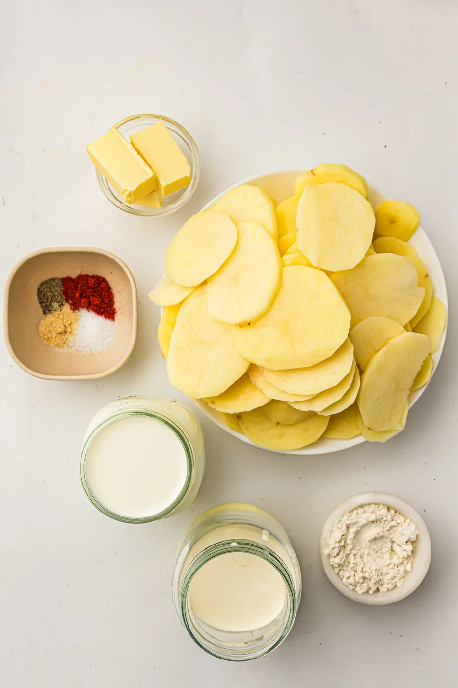 Ingredients for creamy scalloped potatoes without cheese