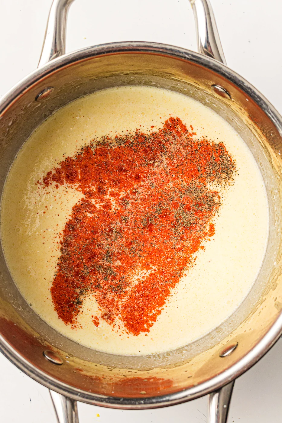 Paprika garlic salt and pepper added to the cream sauce