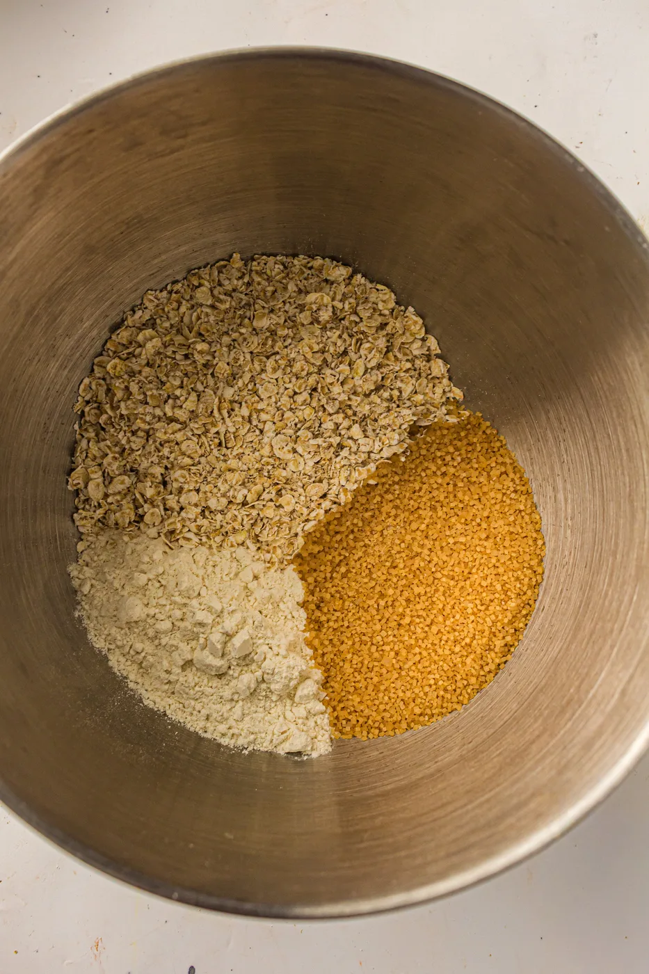 Oats, flour, and coarse brown sugar for skillet apple crisp