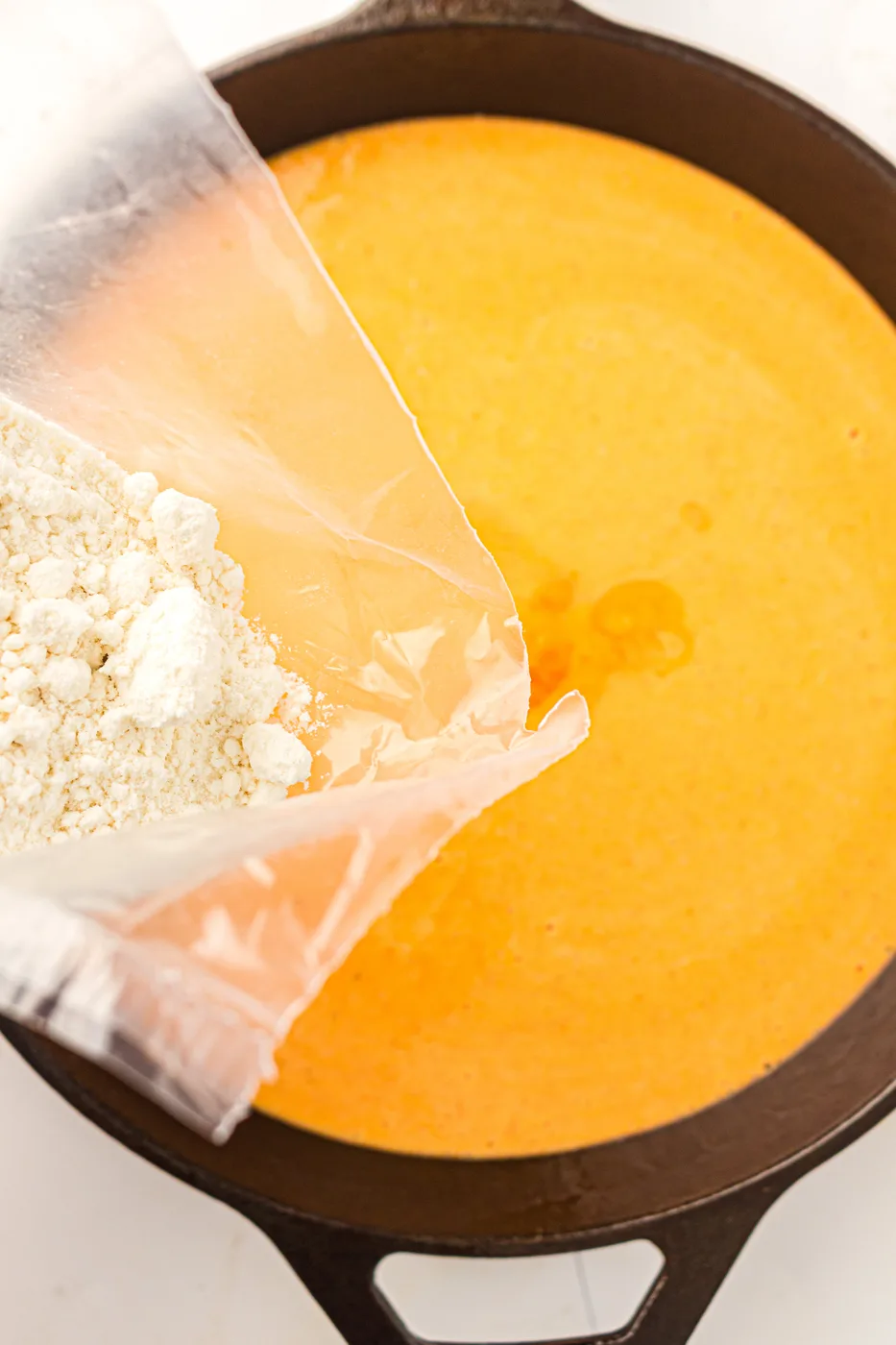 skillet pumpkin dump cake add mix