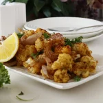 Spiced roasted cauliflower and red onion with lemon and parsley