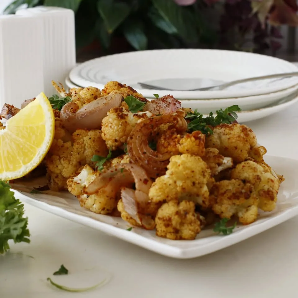 Spiced roasted cauliflower and red onion with lemon and parsley